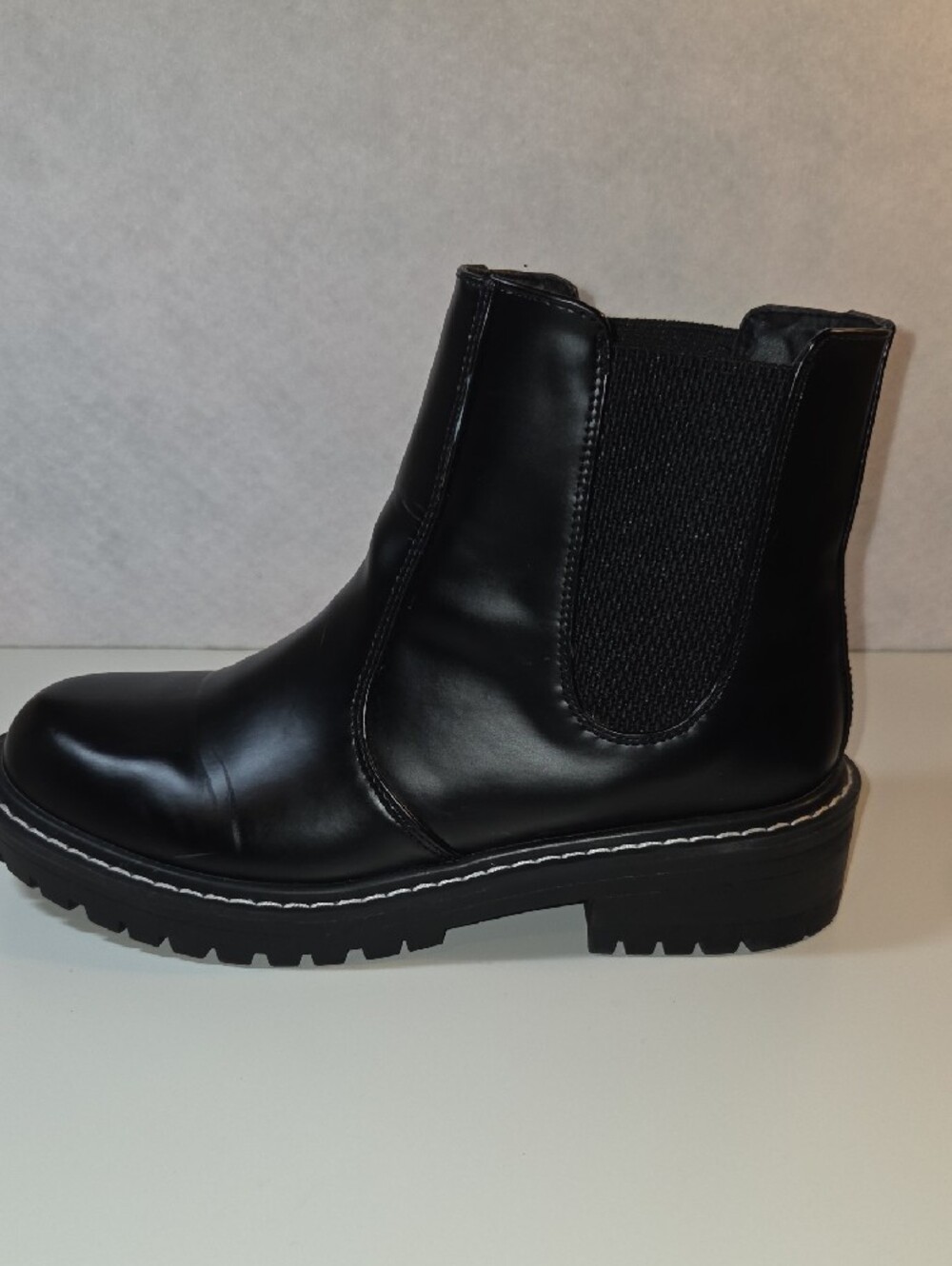 Black Leather Lug-Sole Chelsea Booties - Picture 3 of 5